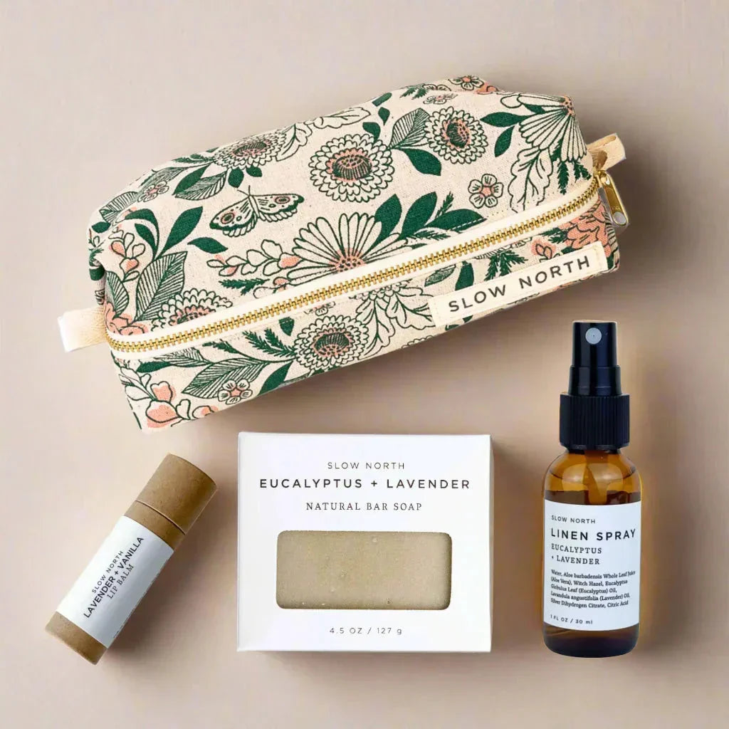 Floral pouch, eucalyptus lavender soap, linen spray, and balm gift set from Qu!rk Boutique.