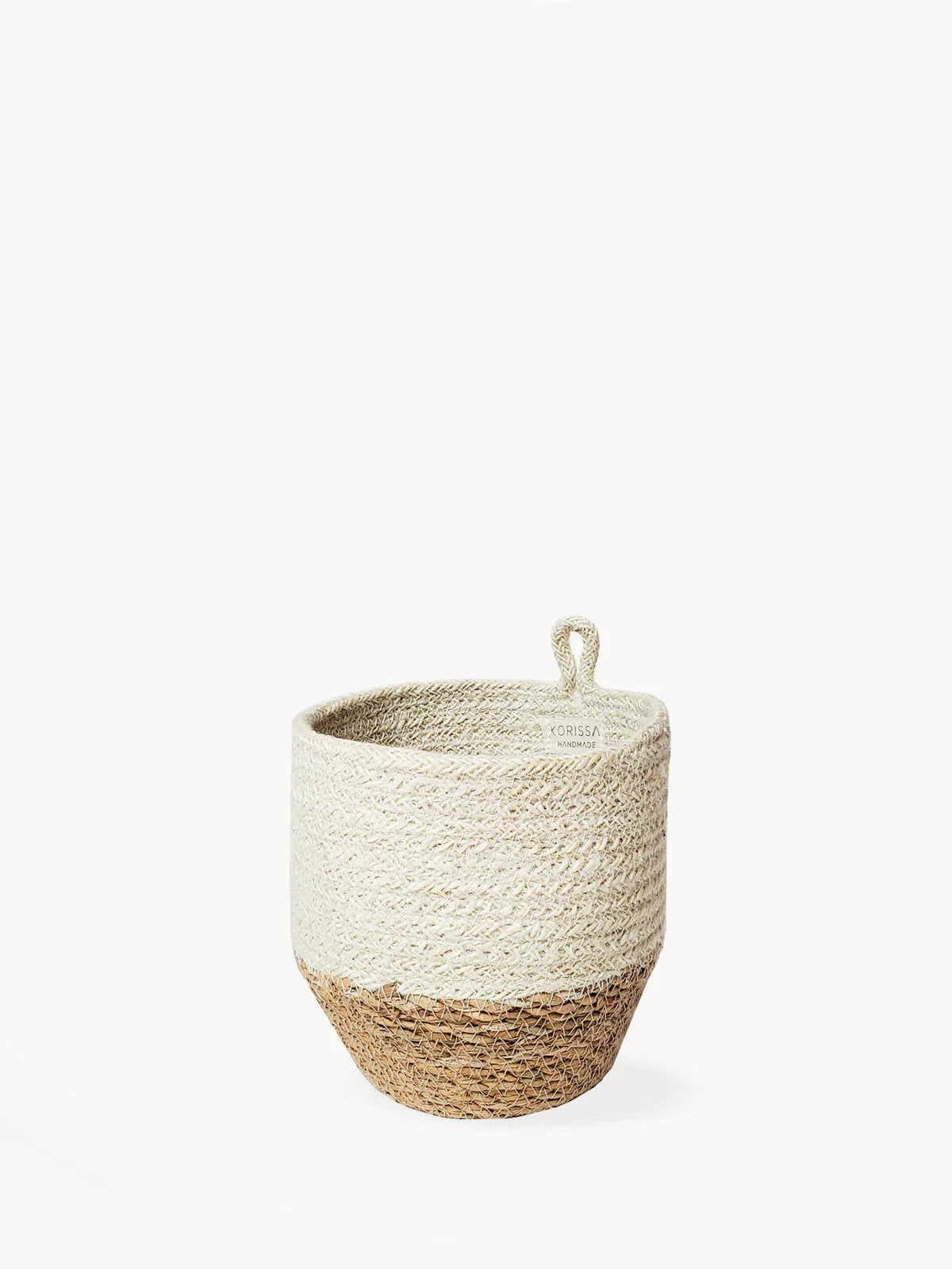 Handmade natural woven storage basket with loop handle, beige and brown, ethical home decor