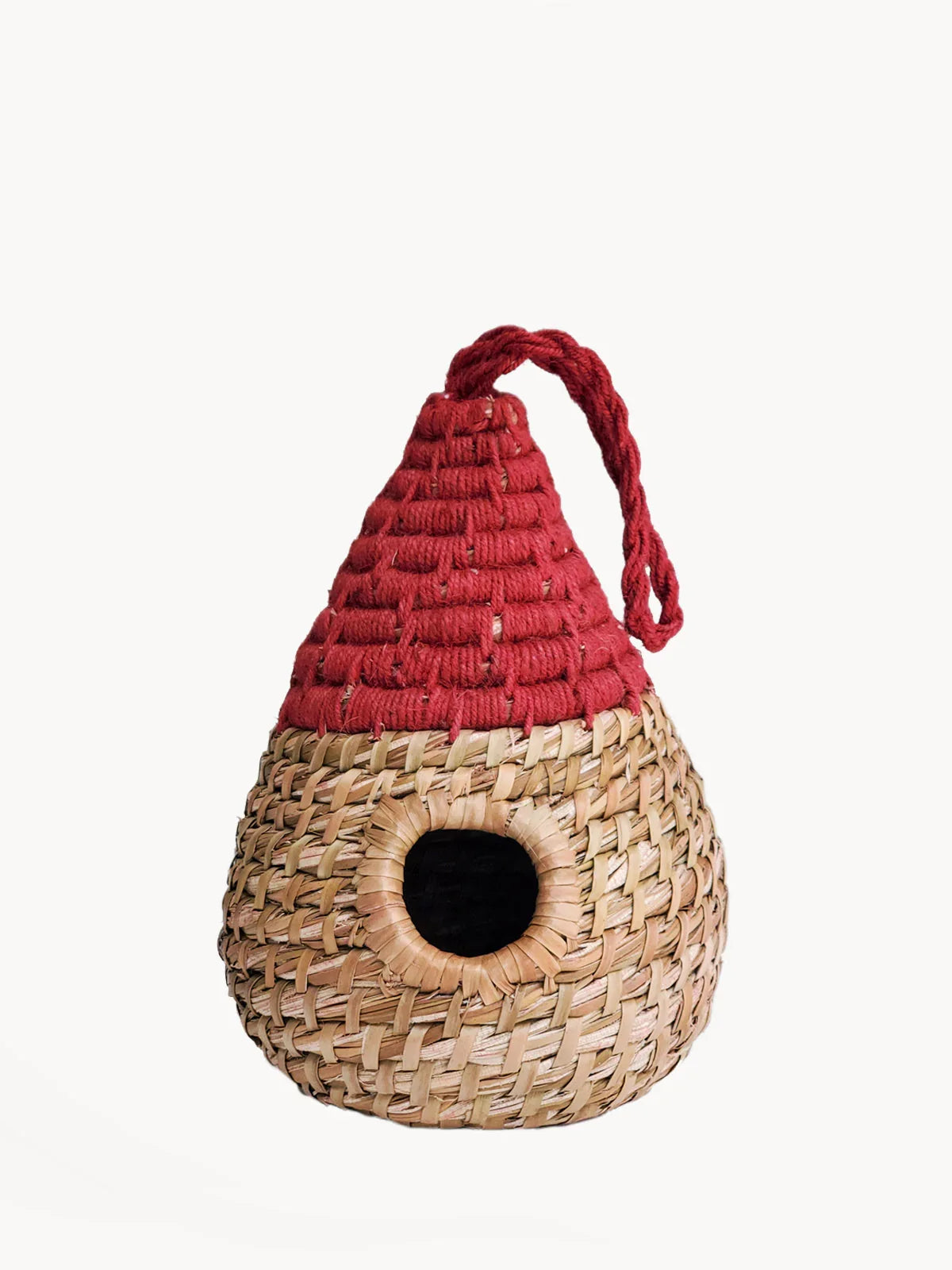 Handwoven natural fiber and red rope birdhouse with round entrance and hanging loop
