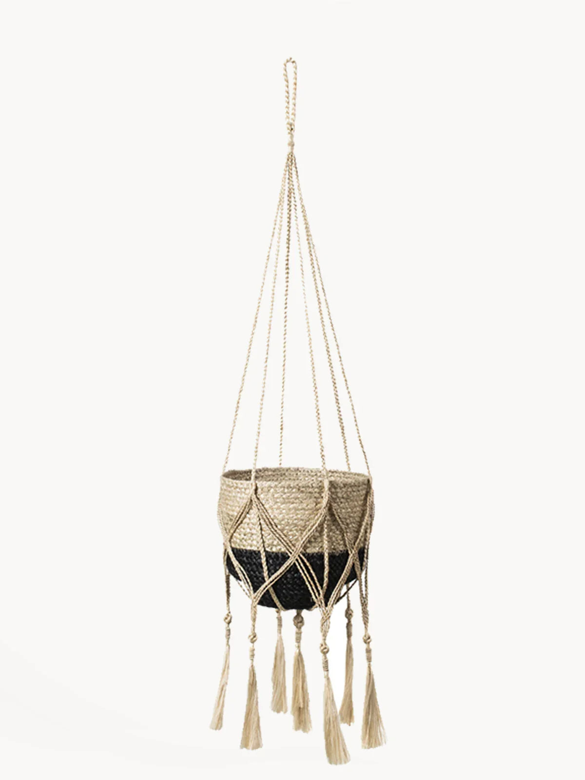 Handmade jute plant hanger with tassels from Qu!rk Boutique, eco-friendly home decor