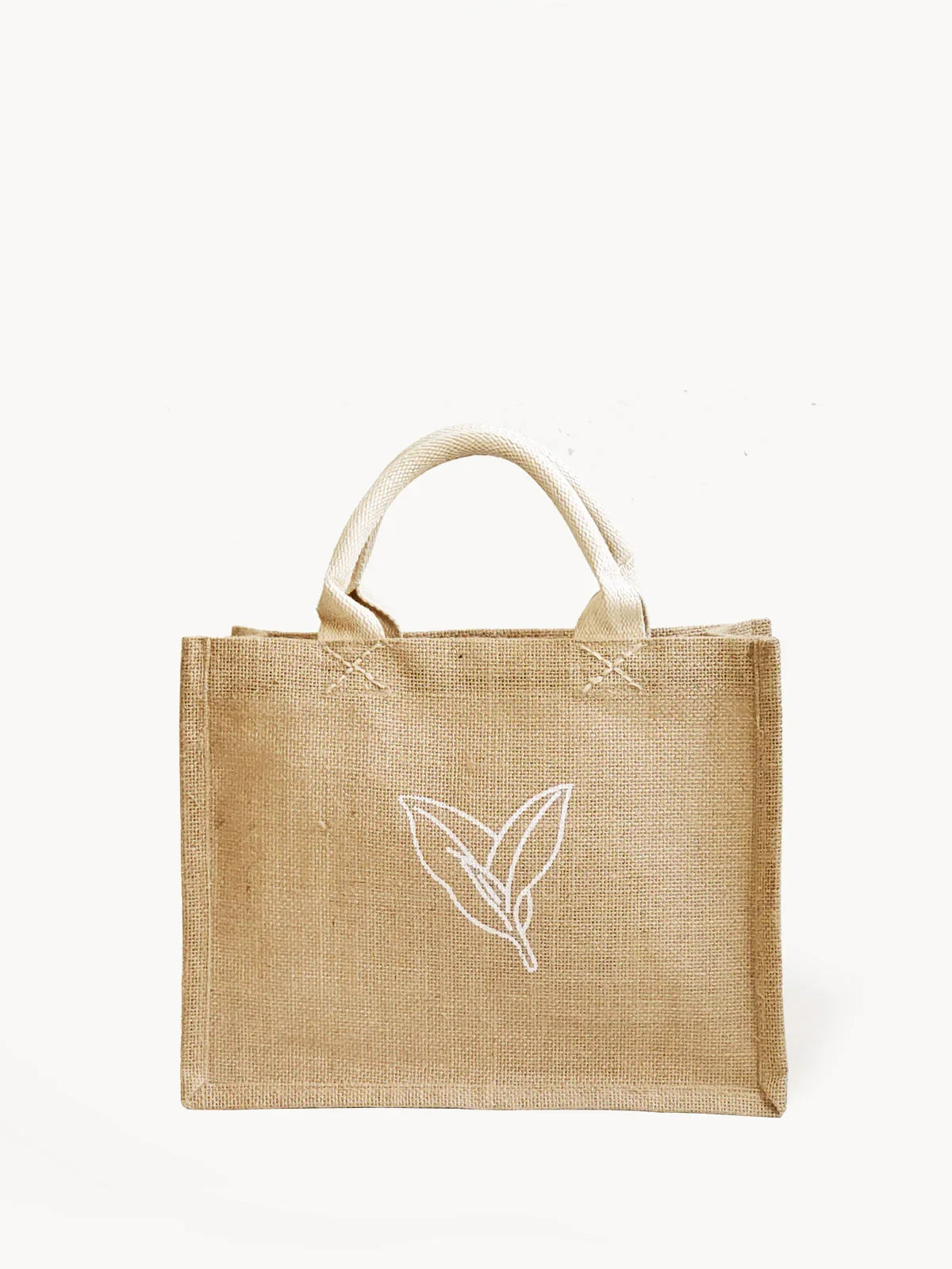 Natural burlap tote bag with white leaf design and white handles, eco-friendly reusable gift bag