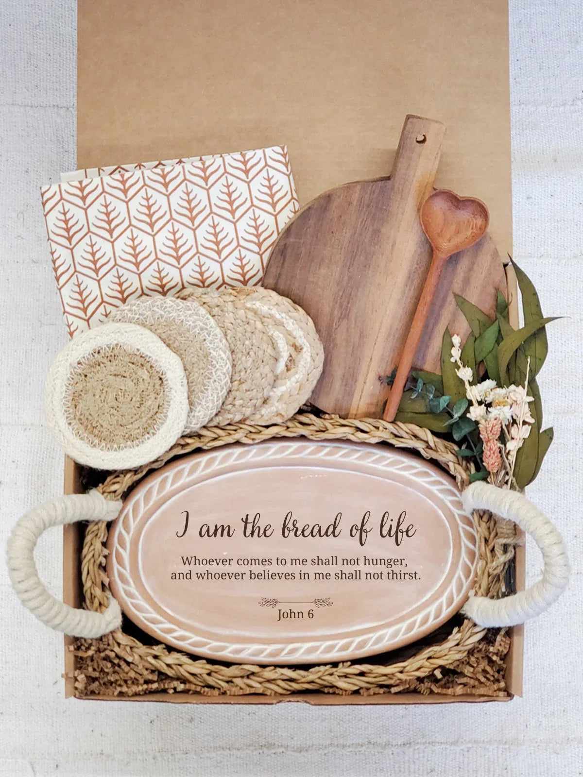 Christian bread warmer gift set with engraved Bible verse plate, cutting board, coasters, and decorative spoon