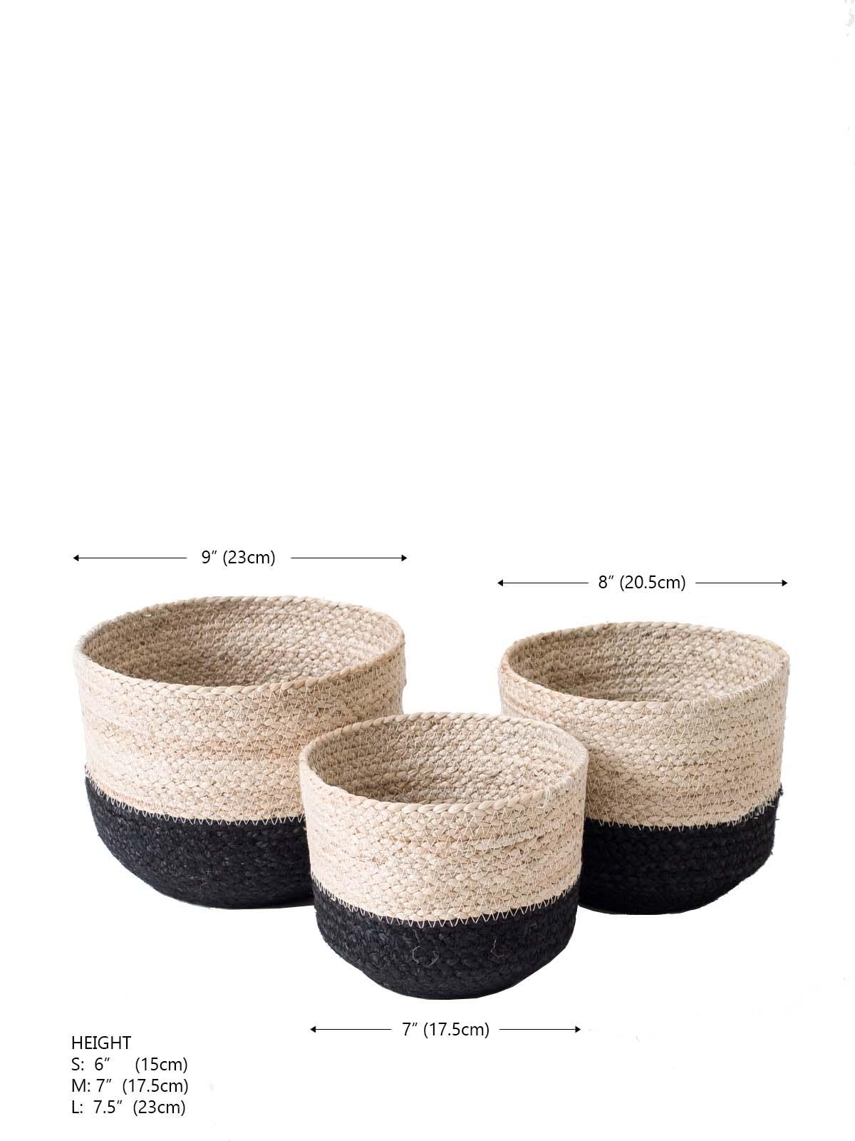 Set of three woven storage baskets in natural and black colors with size measurements