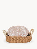 Handwoven bread warmer basket with rope handles and oval ceramic lid featuring a bird and letter P monogram