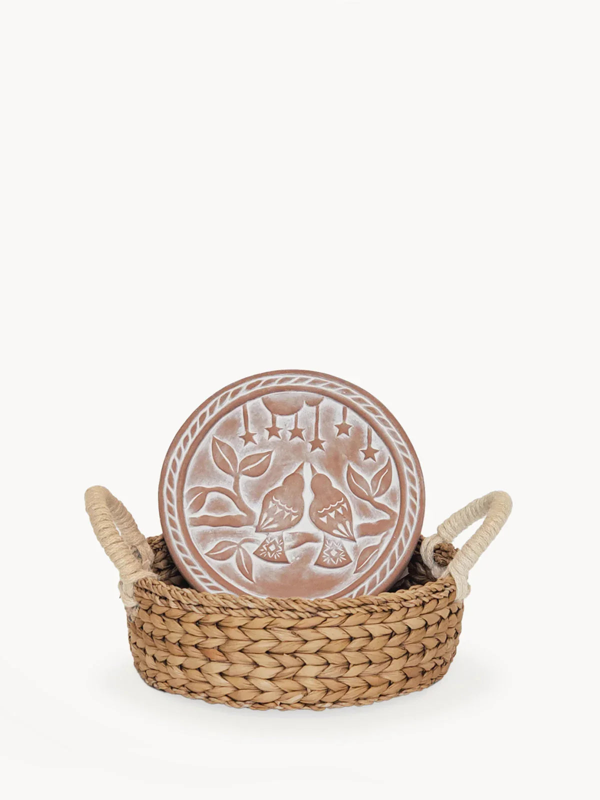 Round bread warmer basket with woven natural fibers and decorative lid featuring two birds and star motifs