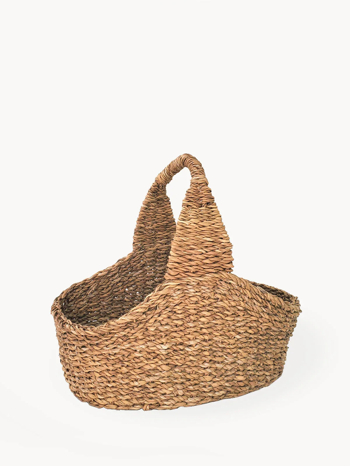 Handwoven seagrass picnic basket with curved handle, eco-friendly from Qu!rk Boutique
