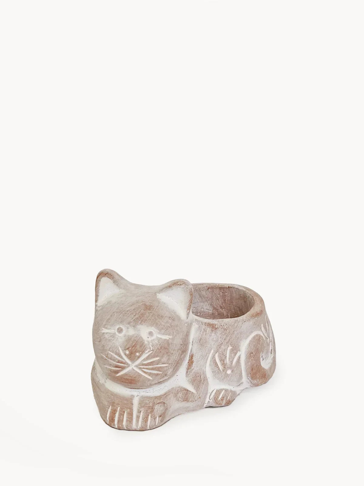 Terracotta cat-shaped candle holder with carved whiskers and floral patterns