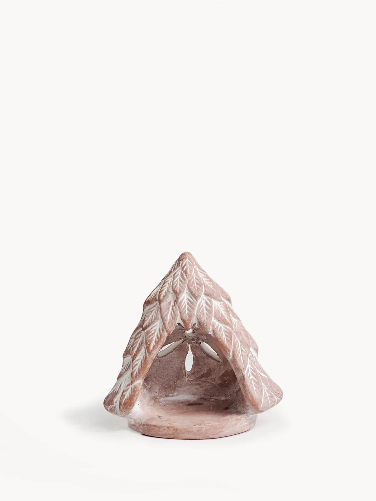 Terracotta candle holder shaped like a leaf-covered tree with carved details