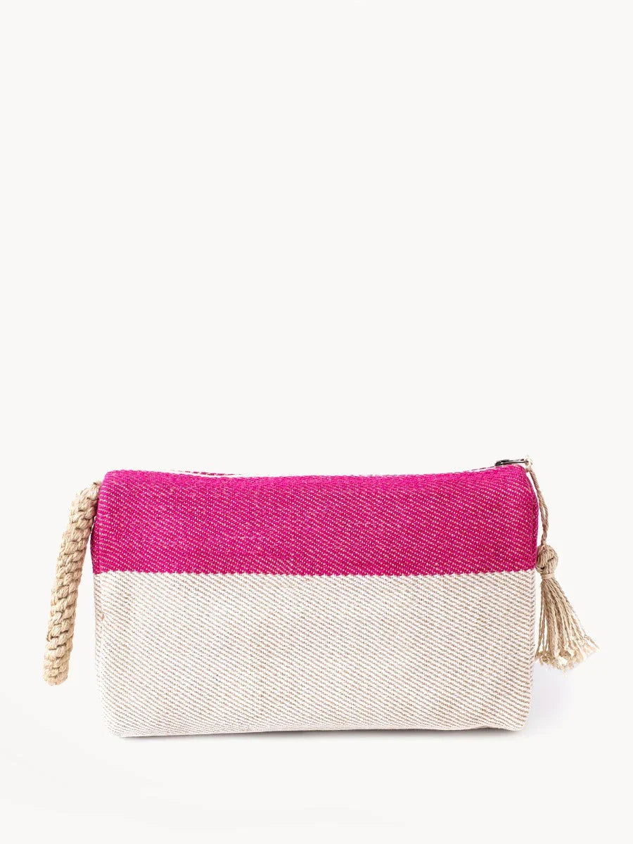 Pink and natural woven fabric clutch bag with braided handle and tassel zipper pull