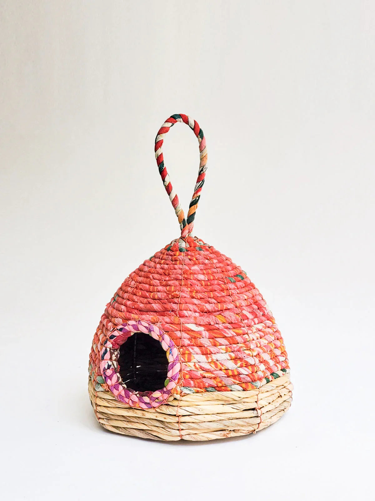 Handwoven pink and natural straw birdhouse with loop, artisan garden decor from Qu!rk Boutique
