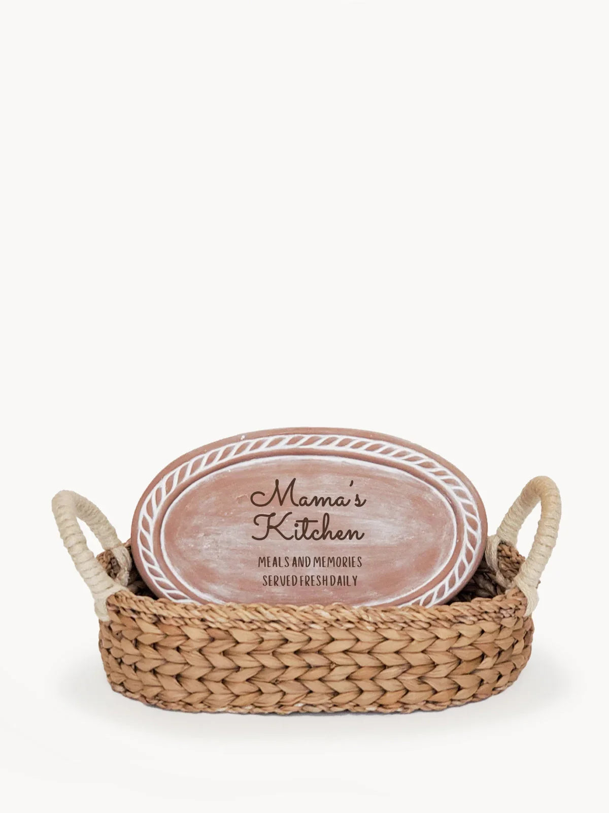 Oval wooden sign reading Mama's Kitchen with woven basket tray and rope handles
