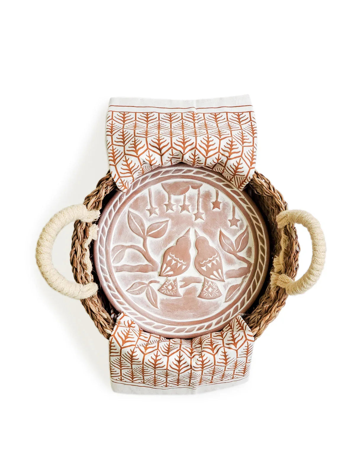 Artist-designed round lovebird tray in a woven basket with a patterned tea towel at Qu!rk Boutique