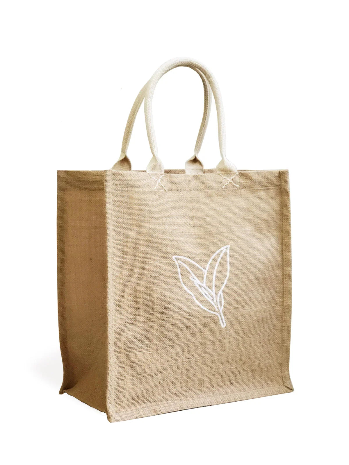 Natural jute market bag with white leaf design and sturdy fabric handles