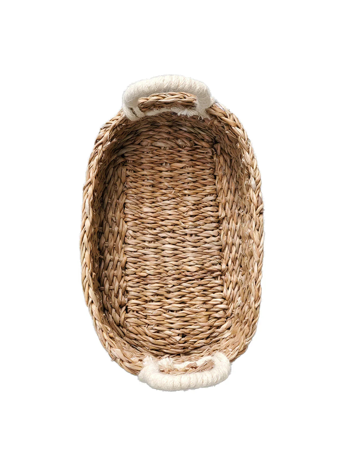 Oval woven bread basket with two white rope handles on a white background