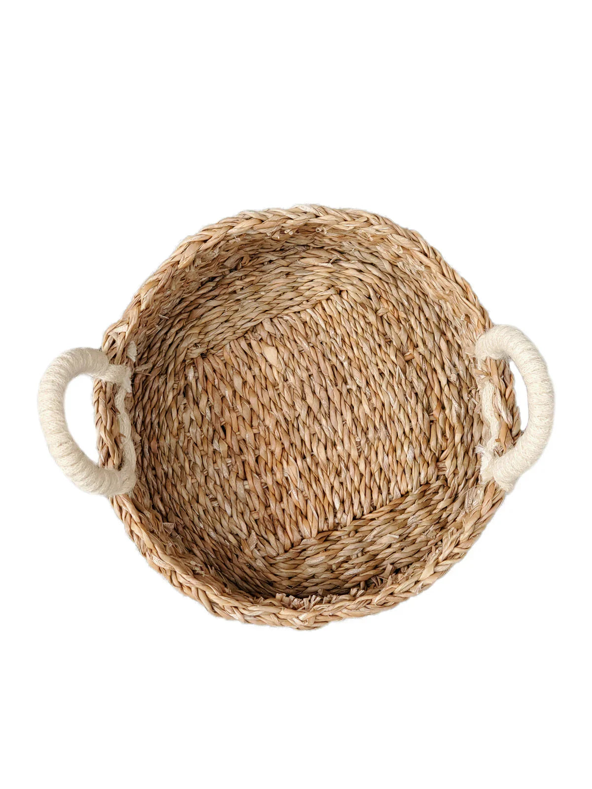 Round woven bread basket with rope handles, natural seagrass material, white background
