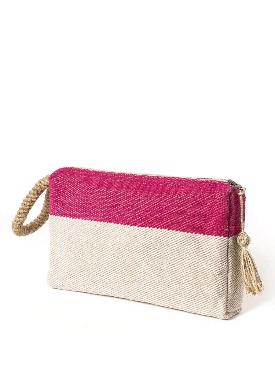 Pink and cream fabric clutch bag with braided strap and tassel on zipper