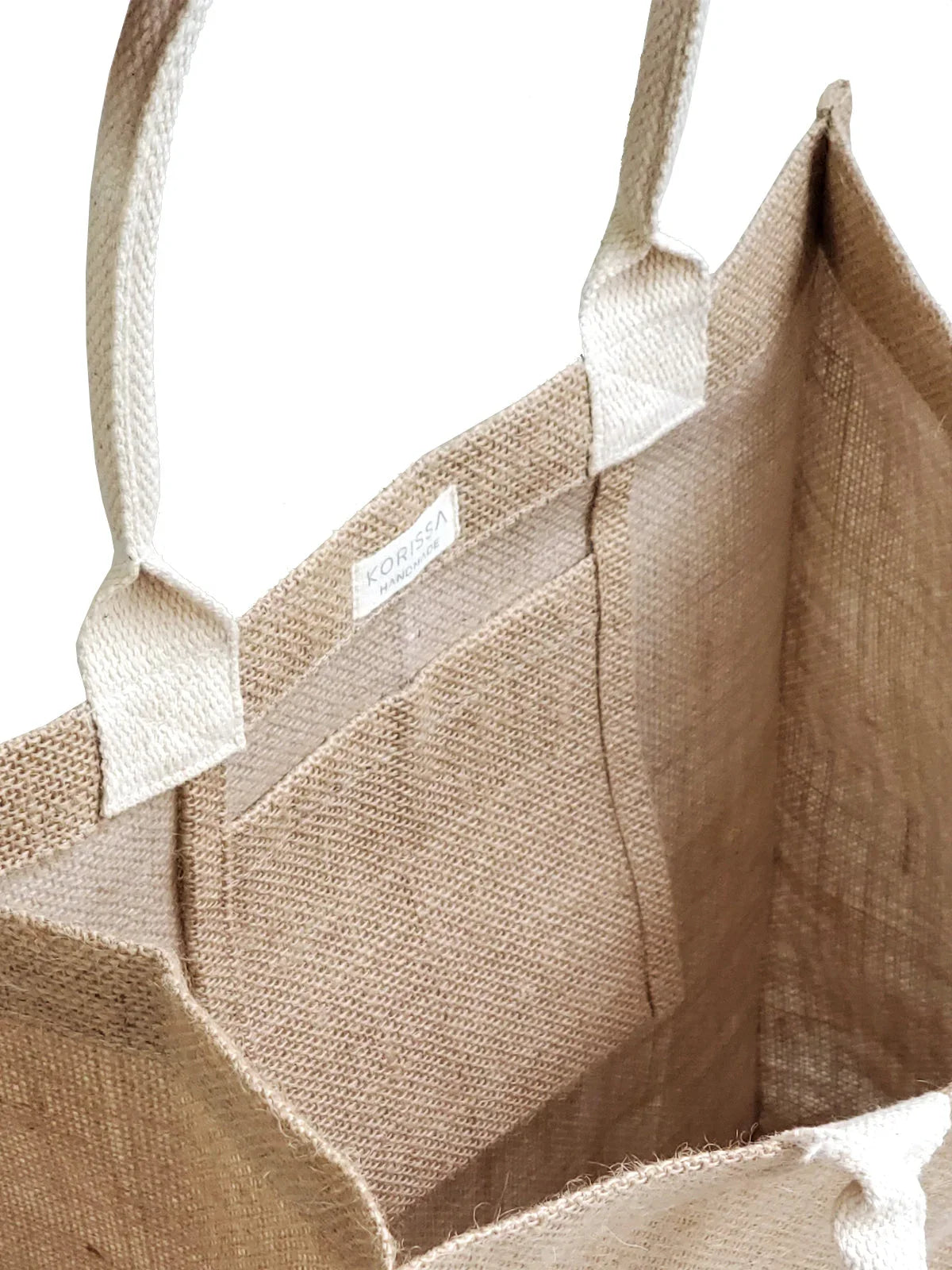 Eco-friendly jute market tote bag with sturdy handles, natural color, inside pocket, at Qu!rk Boutique