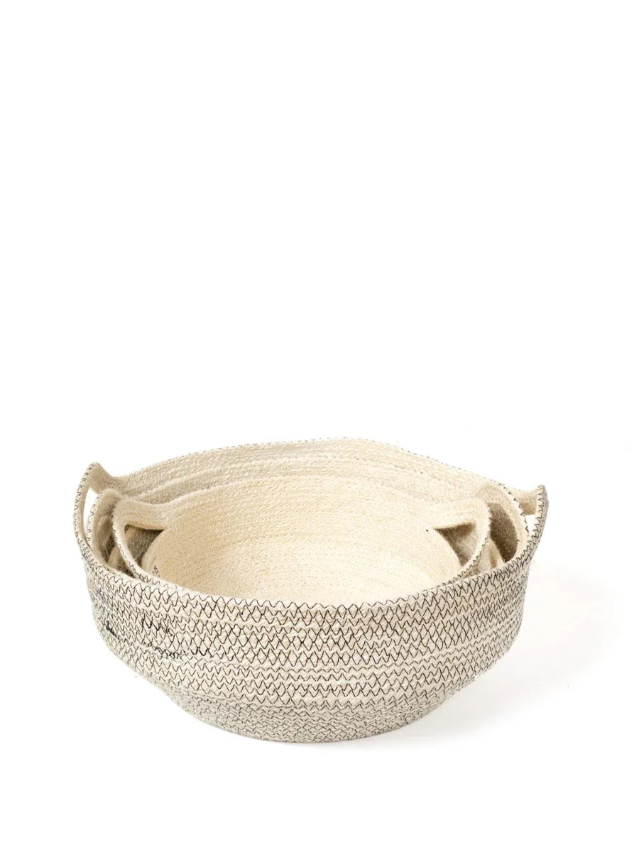 Set of natural woven baskets with black zigzag pattern, artist-designed at Qu!rk Boutique