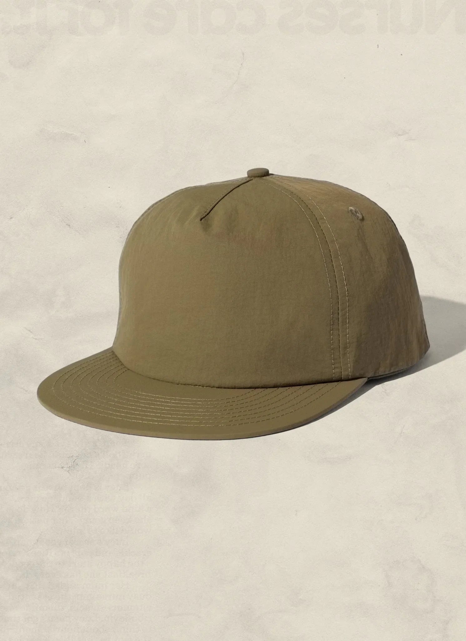 Olive green unisex baseball cap with curved brim on neutral background, Qu!rk Boutique