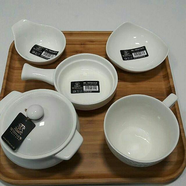 White ceramic bowls and dishes set on a wooden tray, modern kitchenware at Qu!rk Boutique.