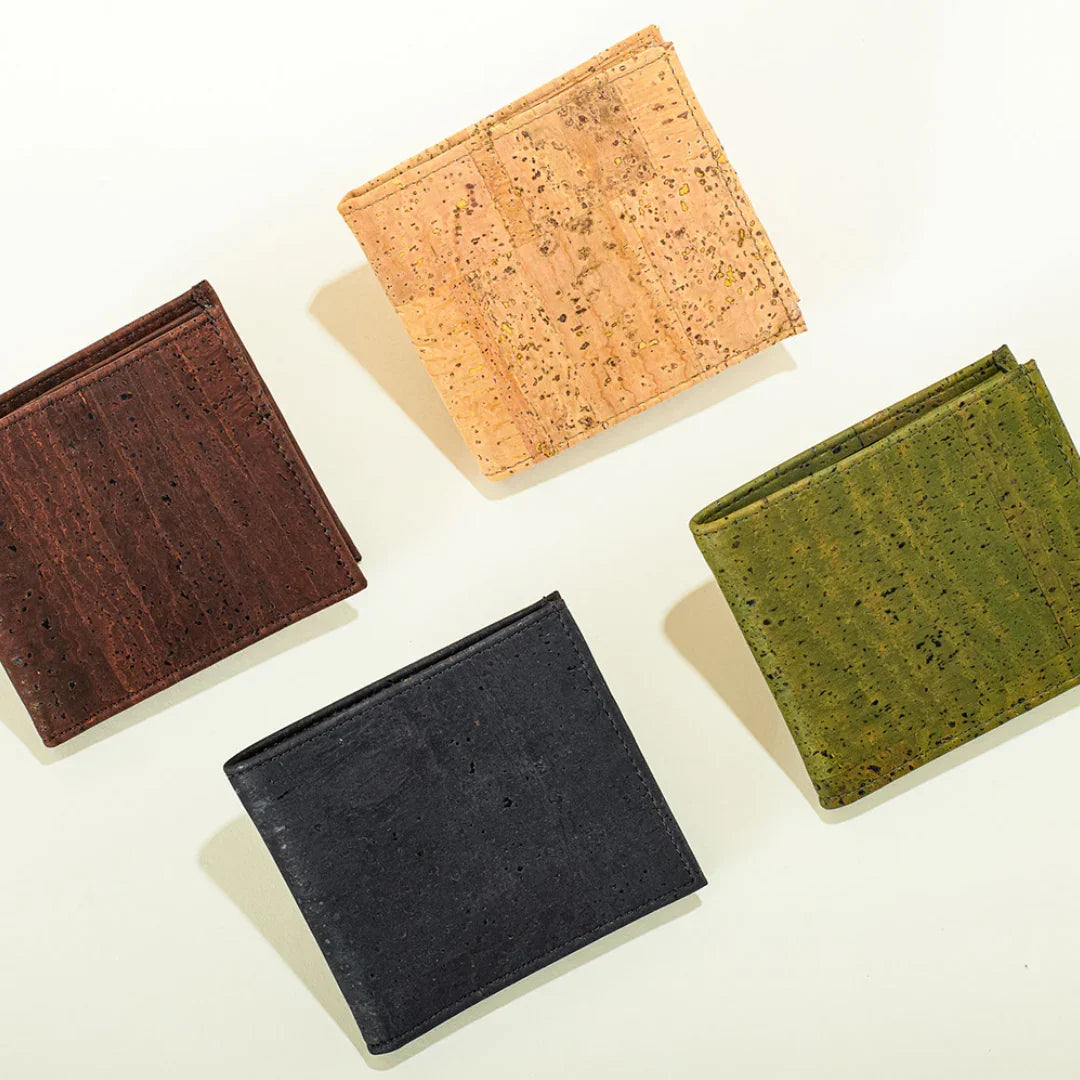 Four recycled cork wallets in brown, natural, black, and green from Qu!rk Boutique