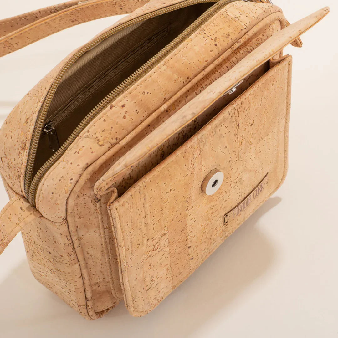 Sustainable cork crossbody bag with zippered top and front magnetic pocket, eco-friendly accessory