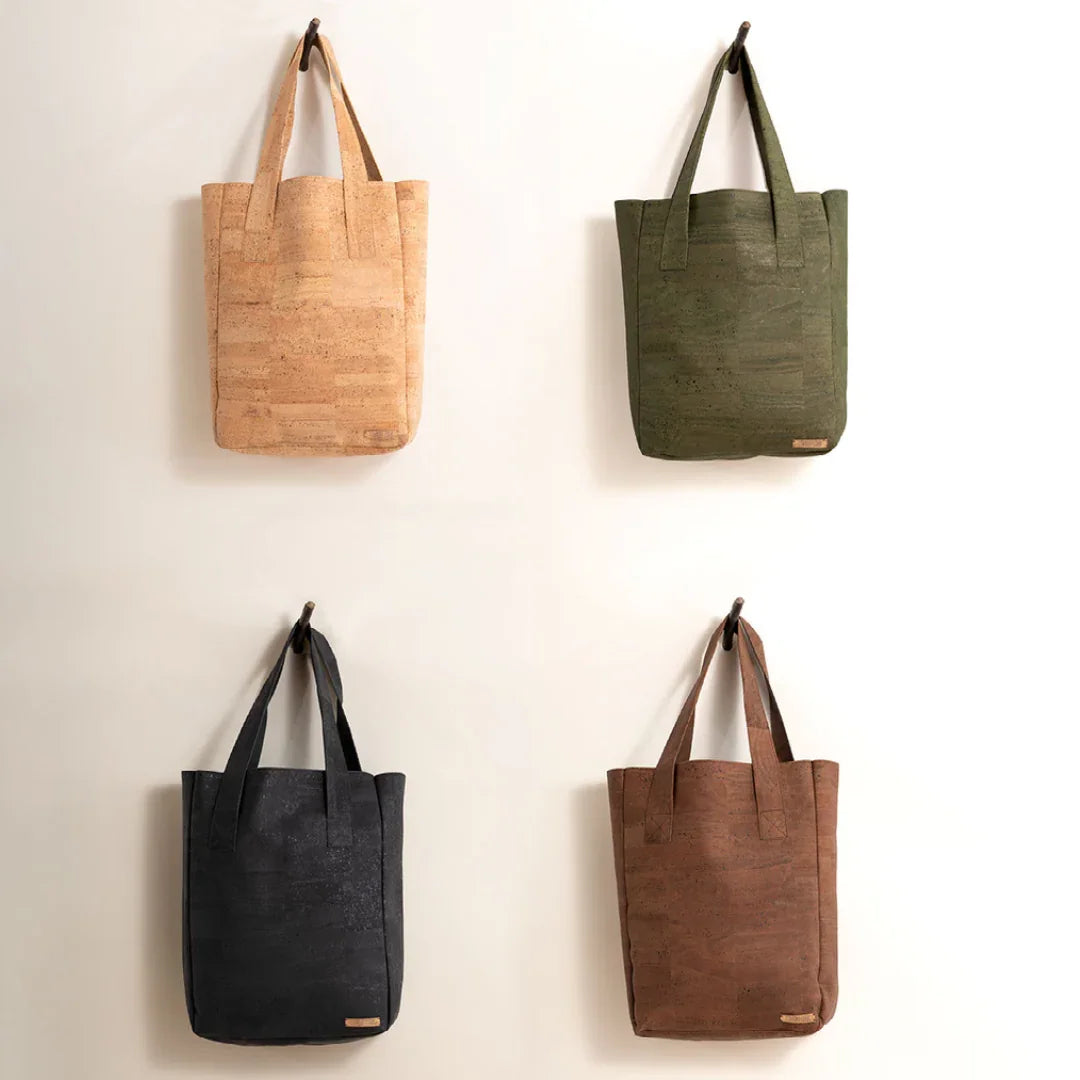 Four vegan cork tote bags in tan, green, black, and brown from Qu!rk Boutique