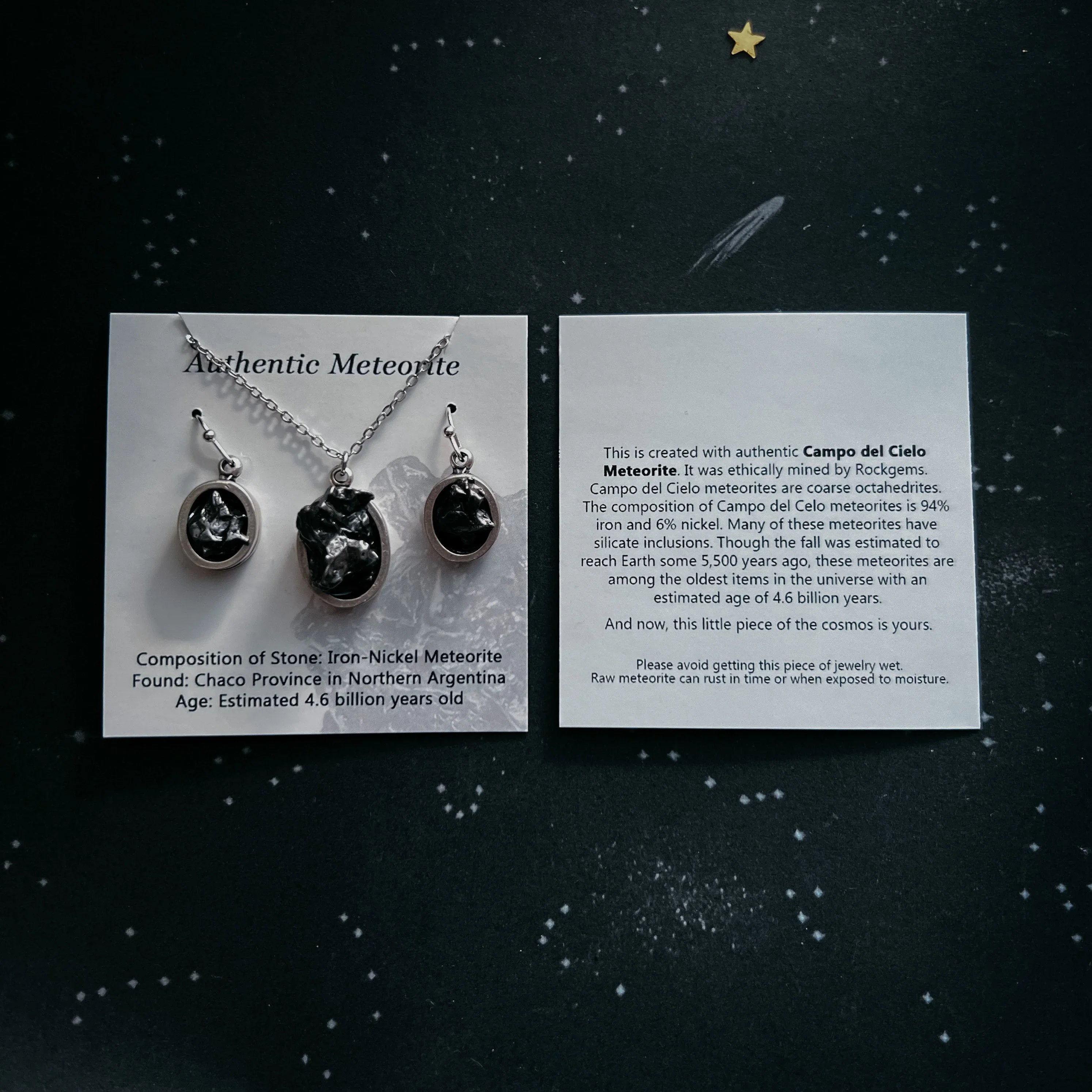 Campo del Cielo meteorite necklace and earrings set on display cards, cosmic background