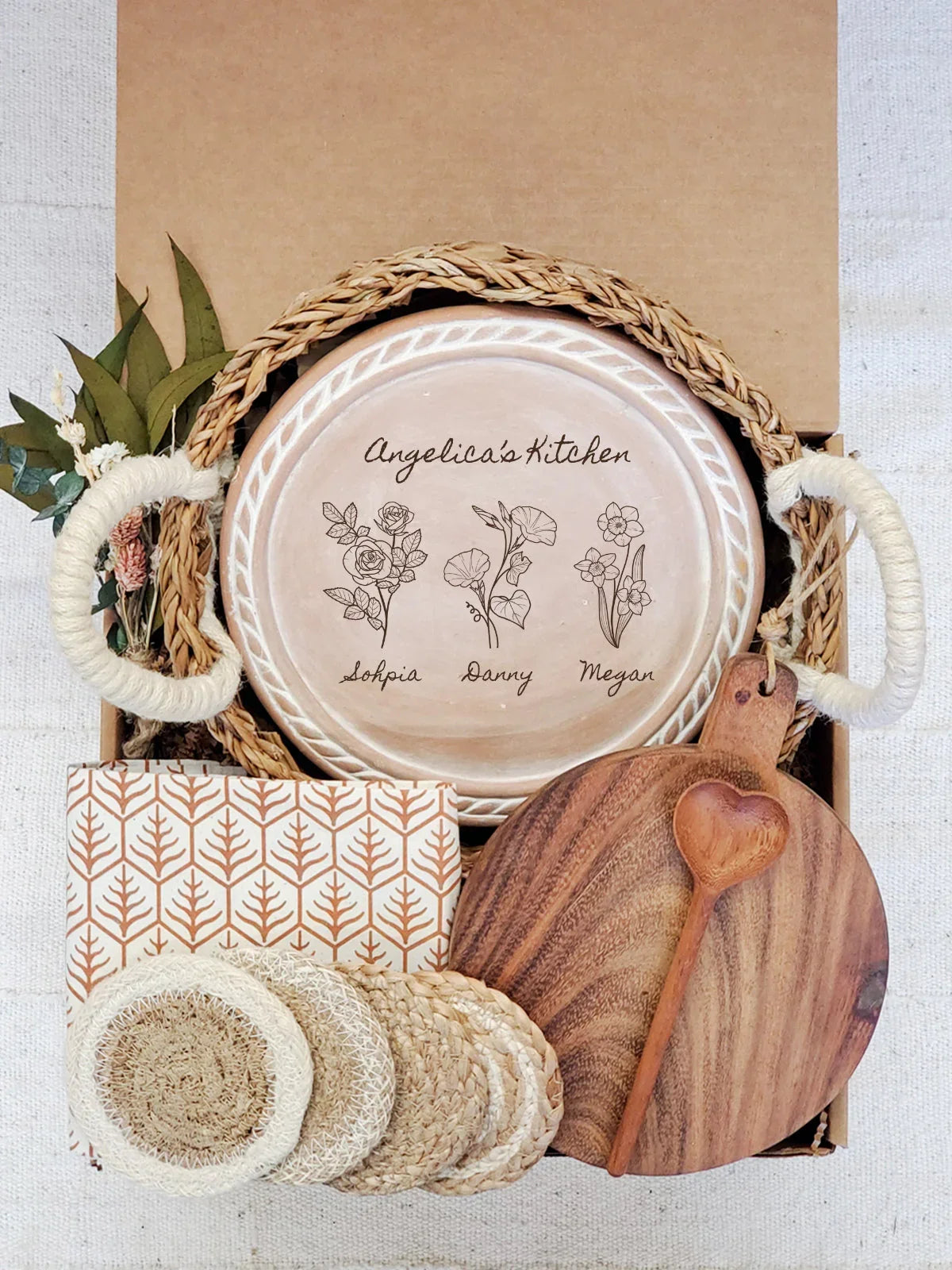 Rustic kitchen gift set with personalized ceramic plate, wooden board, heart spoon, and coasters in gift box