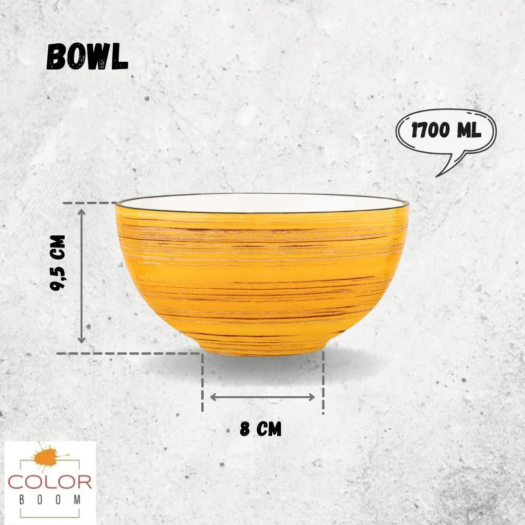 Yellow artist-designed bowl with 1700 ml capacity, 9.5 cm high, 8 cm wide, on concrete background