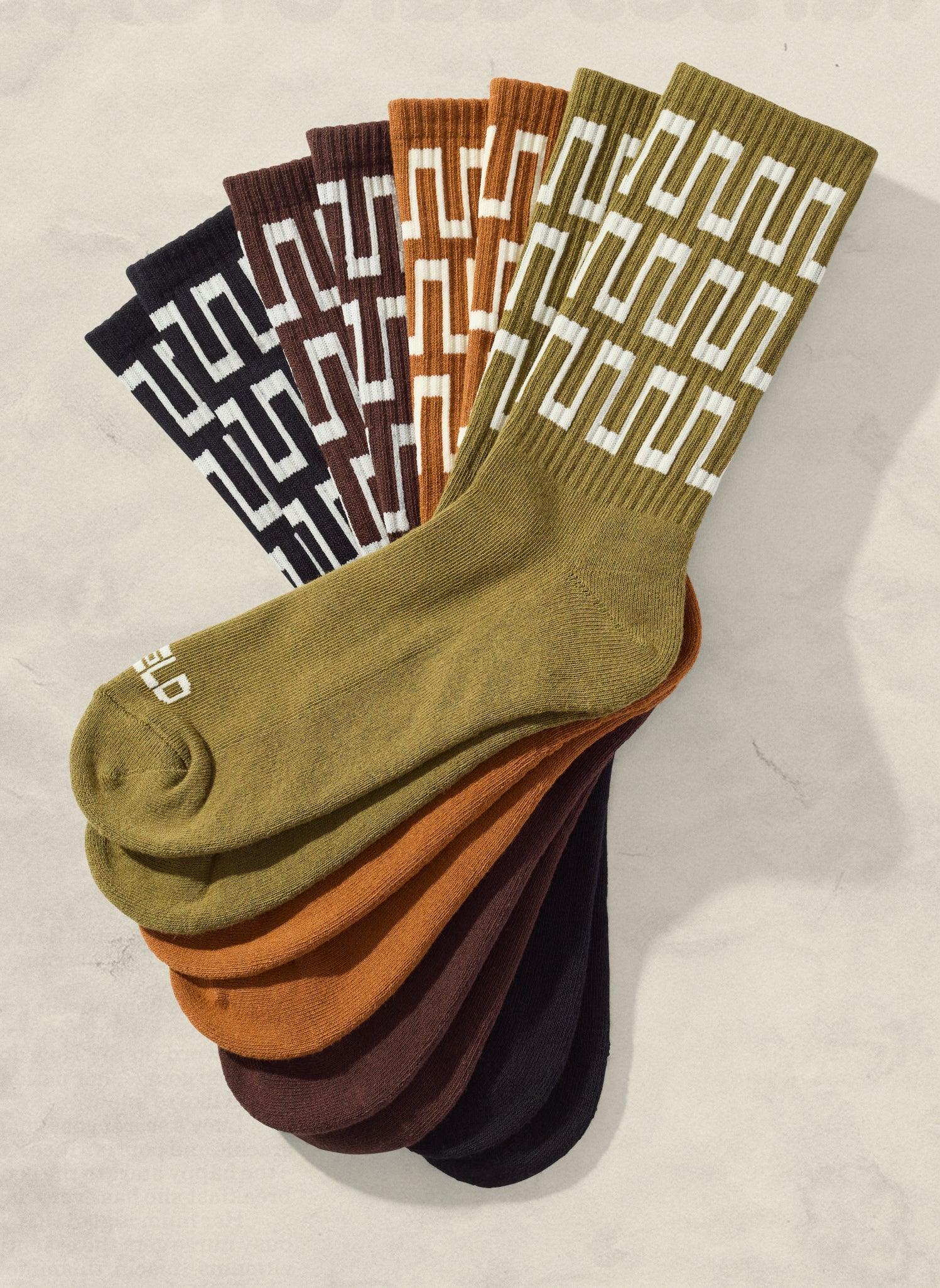 Artist-designed geometric socks in earth tones from Qu!rk Boutique