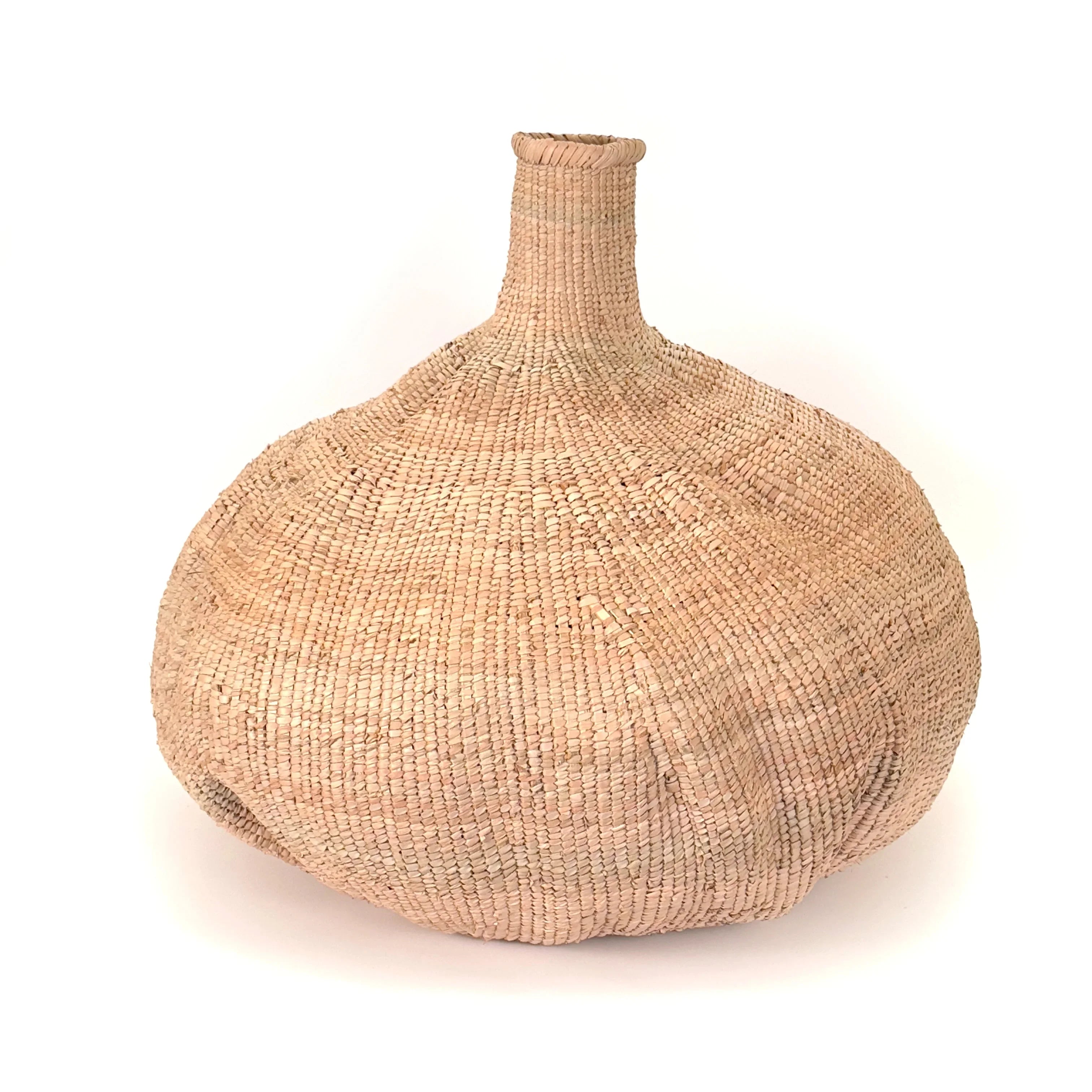 Handwoven natural basket vase with narrow neck on white background, Qu!rk Boutique gift