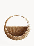 Handwoven natural wicker wall basket with handle, eco-friendly storage from Qu!rk Boutique