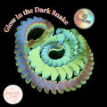 3D printed 32-inch articulated rainbow snake fidget toy, glowing in the dark
