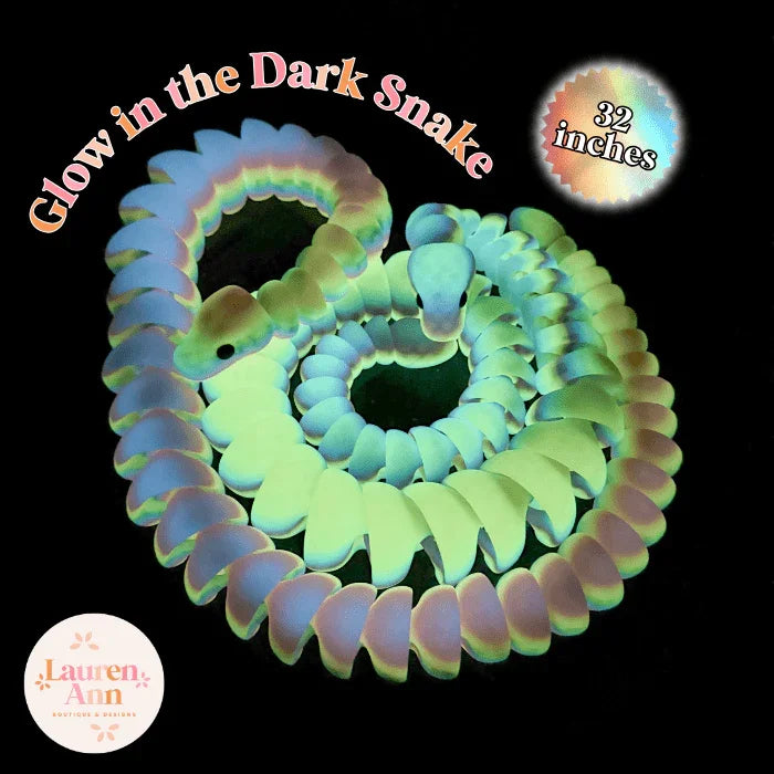 3D printed 32-inch articulated rainbow snake fidget toy, glowing in the dark