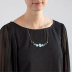 Varying Sized Curved Moon Phase Necklace in Silver - Qu!rk Boutique