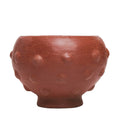 Handmade textured terracotta bowl with raised dot pattern from Qu!rk Boutique