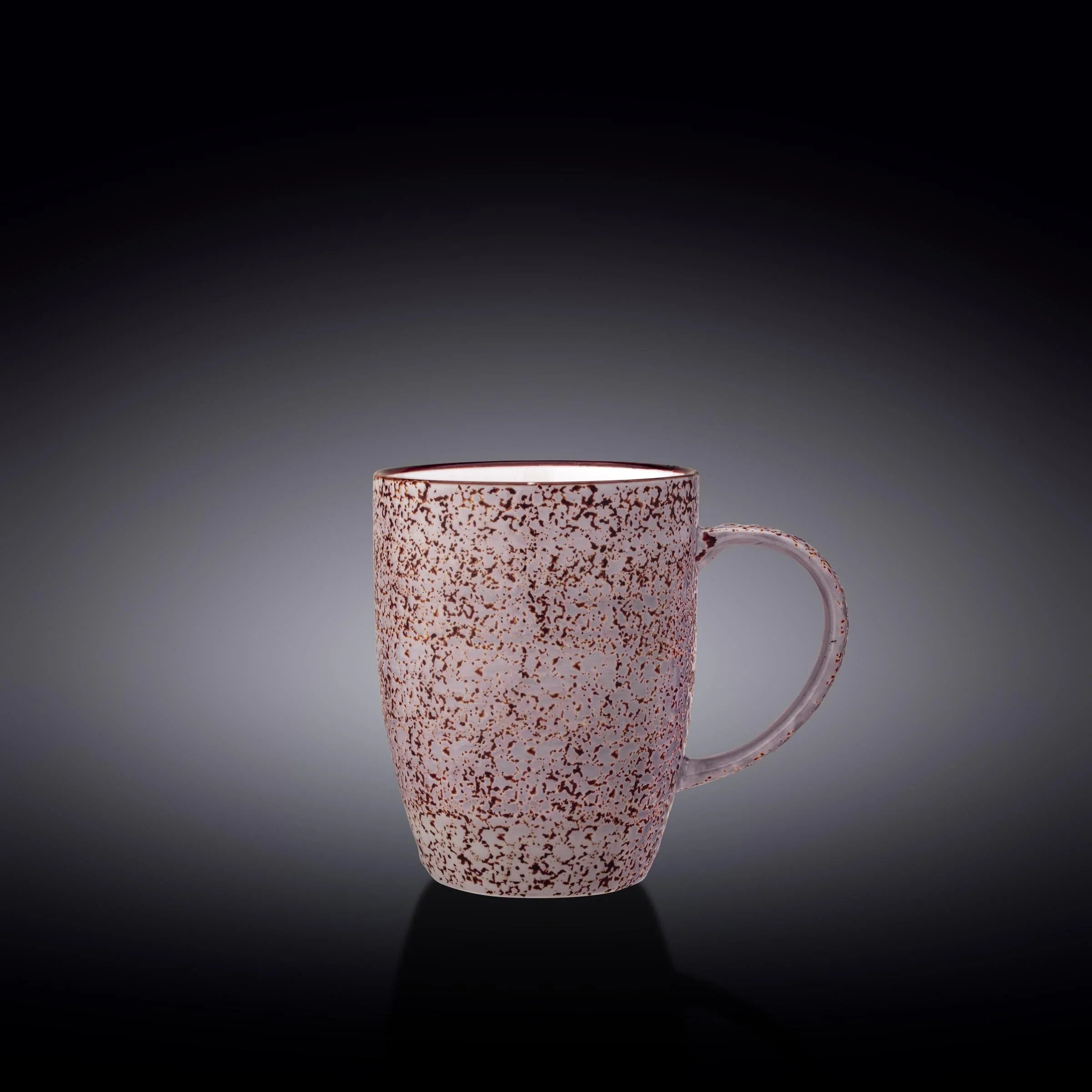 Artist-designed speckled ceramic mug on gradient background, Qu!rk Boutique gift shop product