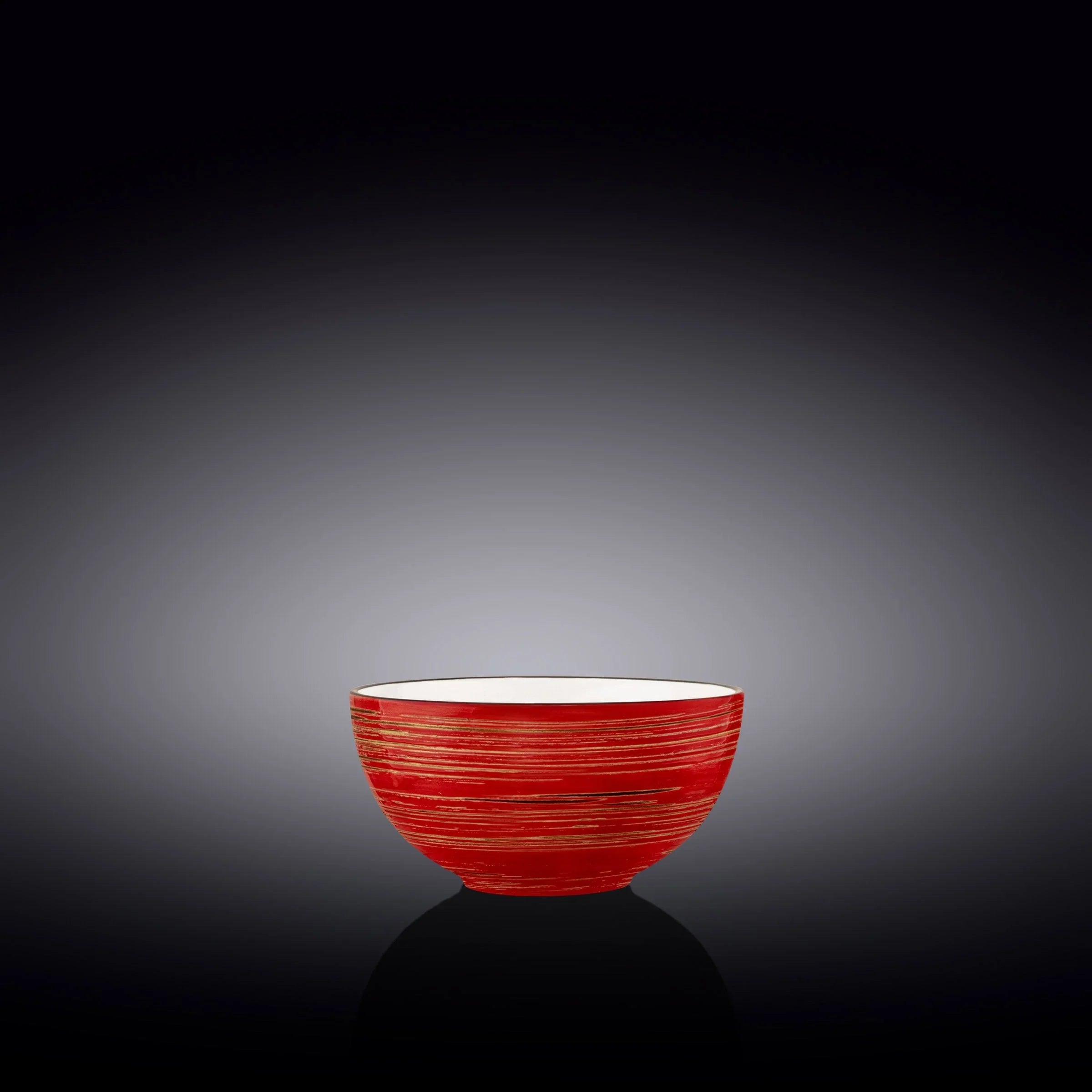 Handcrafted red ceramic bowl with gold accents, artist-designed home decor from Qu!rk Boutique