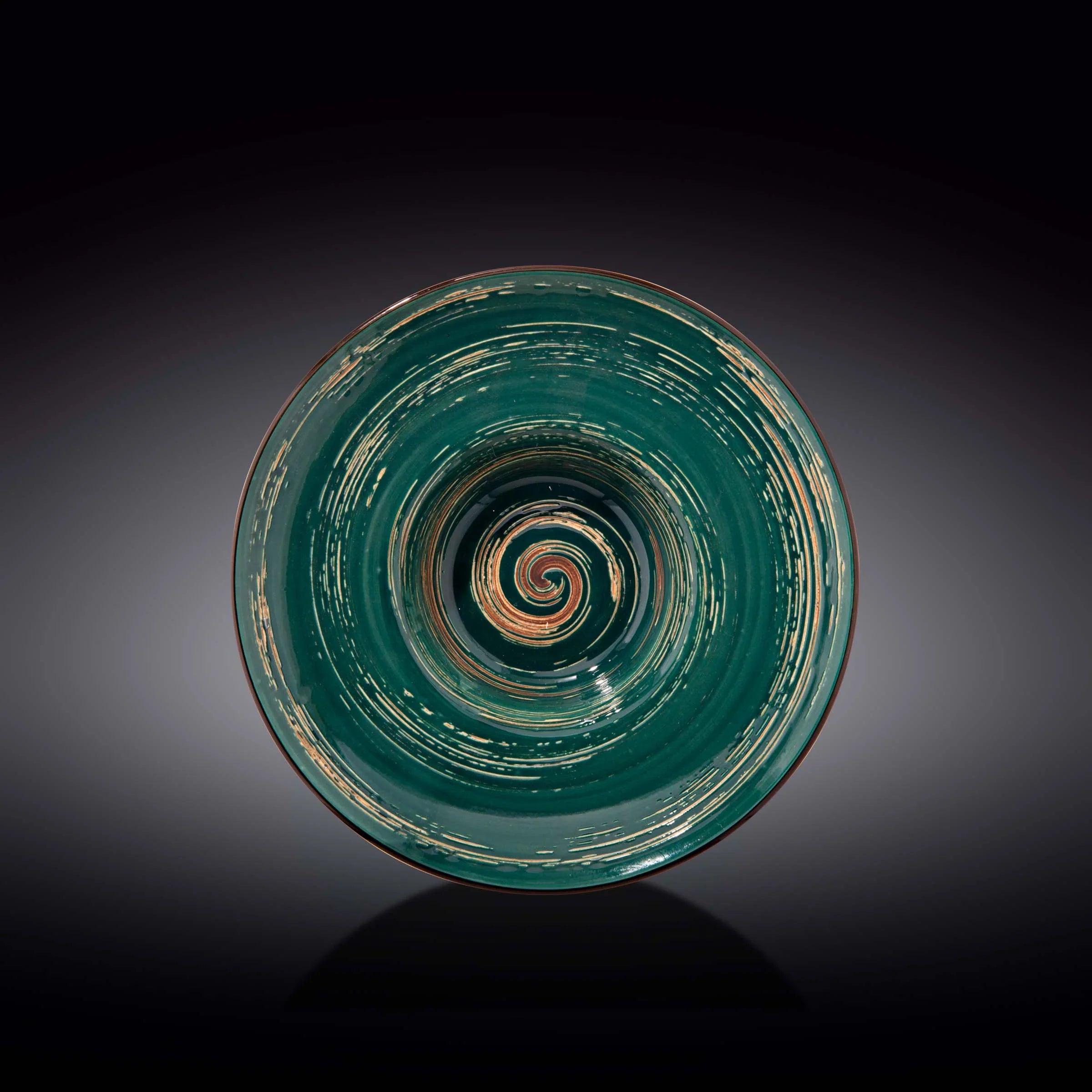 Green ceramic spiral bowl with cosmic-inspired artist design on dark gradient background