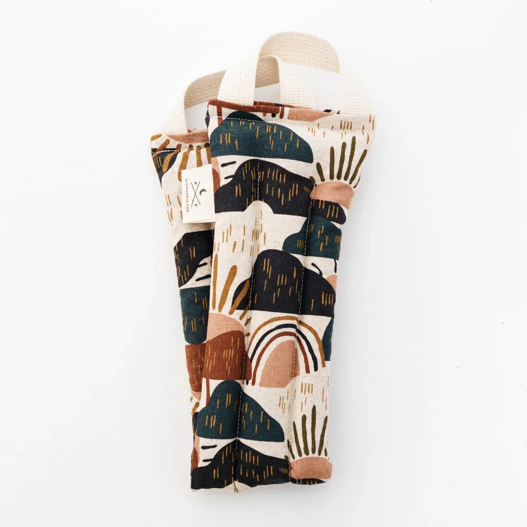 Recycled fabric pouch with abstract earth-tone design from Qu!rk Boutique, eco-friendly gift