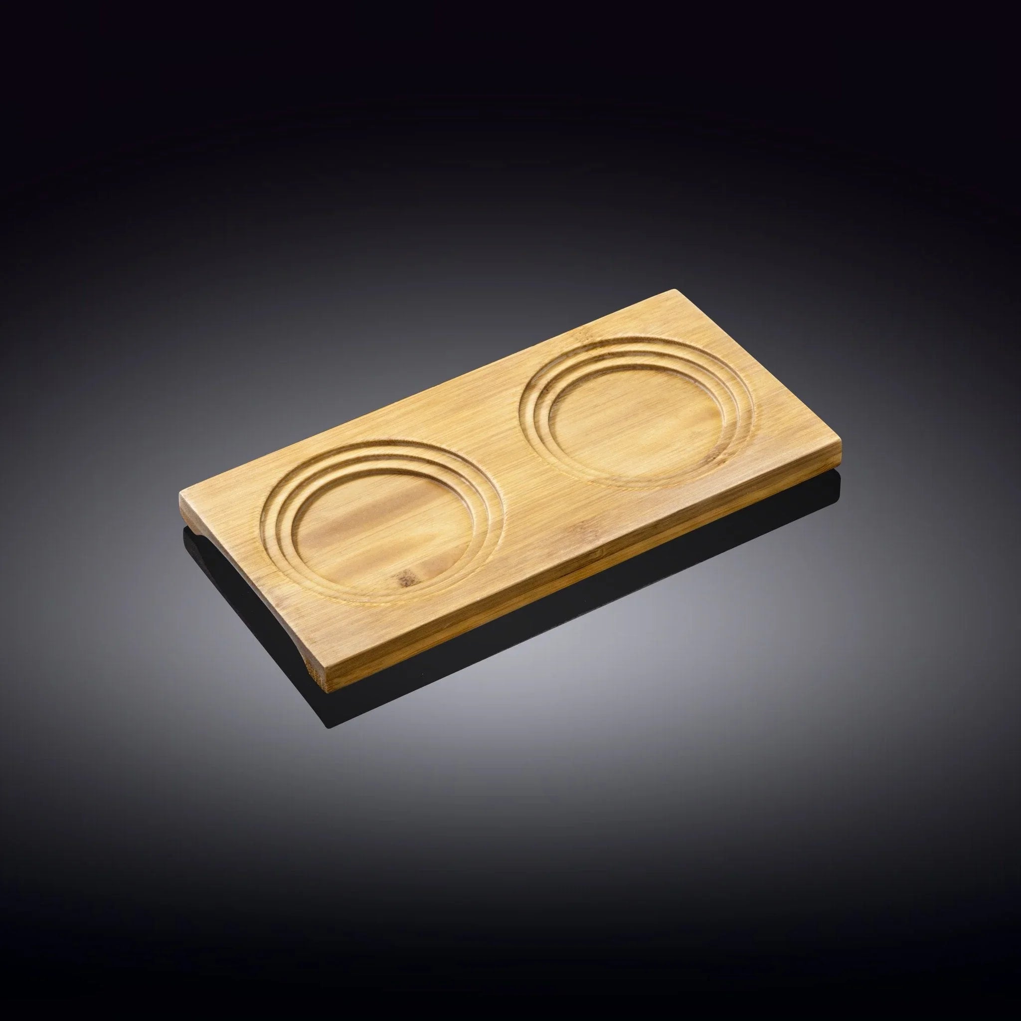 Sustainable bamboo tray with two circular grooves on a dark background, Qu!rk Boutique gift