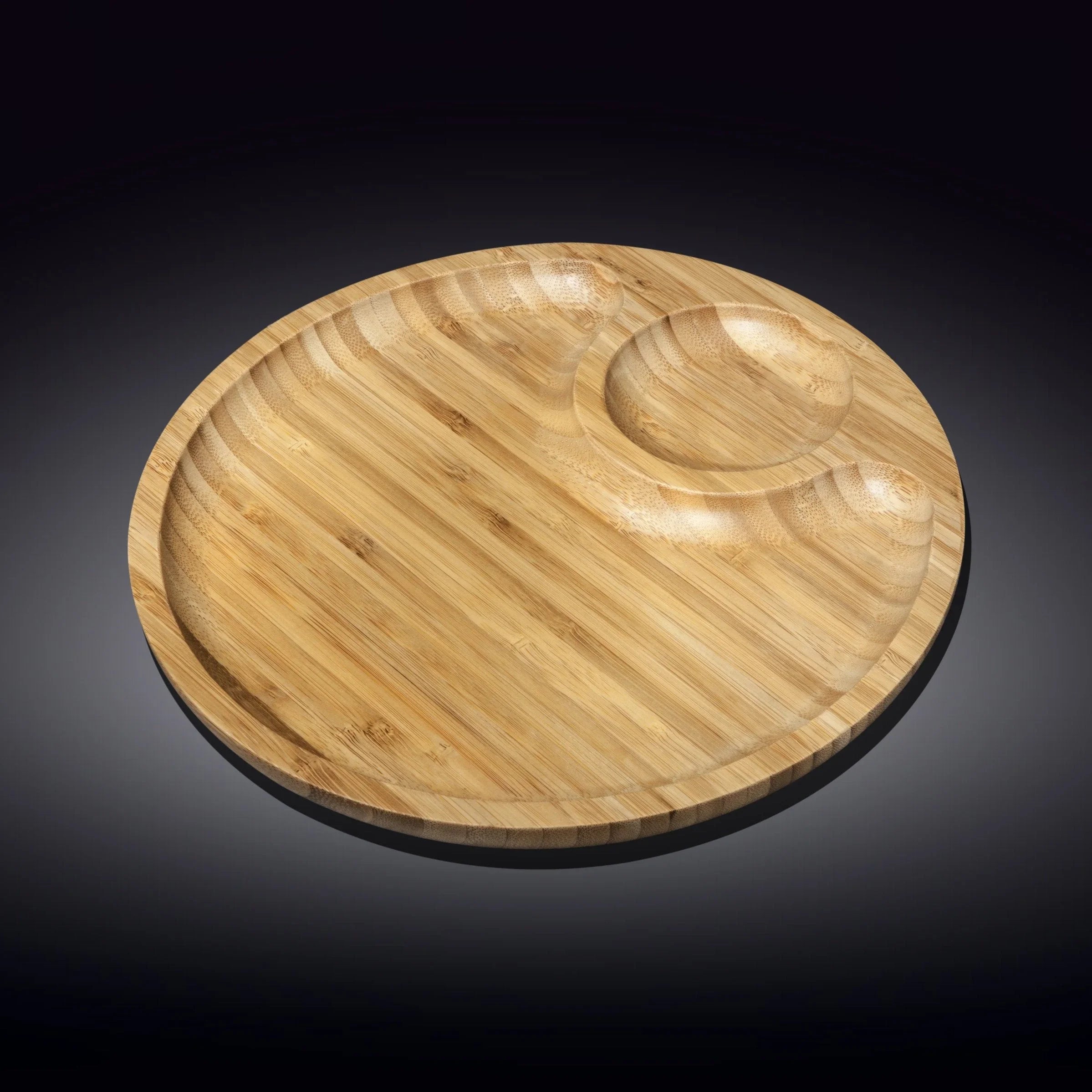 Round bamboo divided platter with sections, on a dark gradient background at Qu!rk Boutique