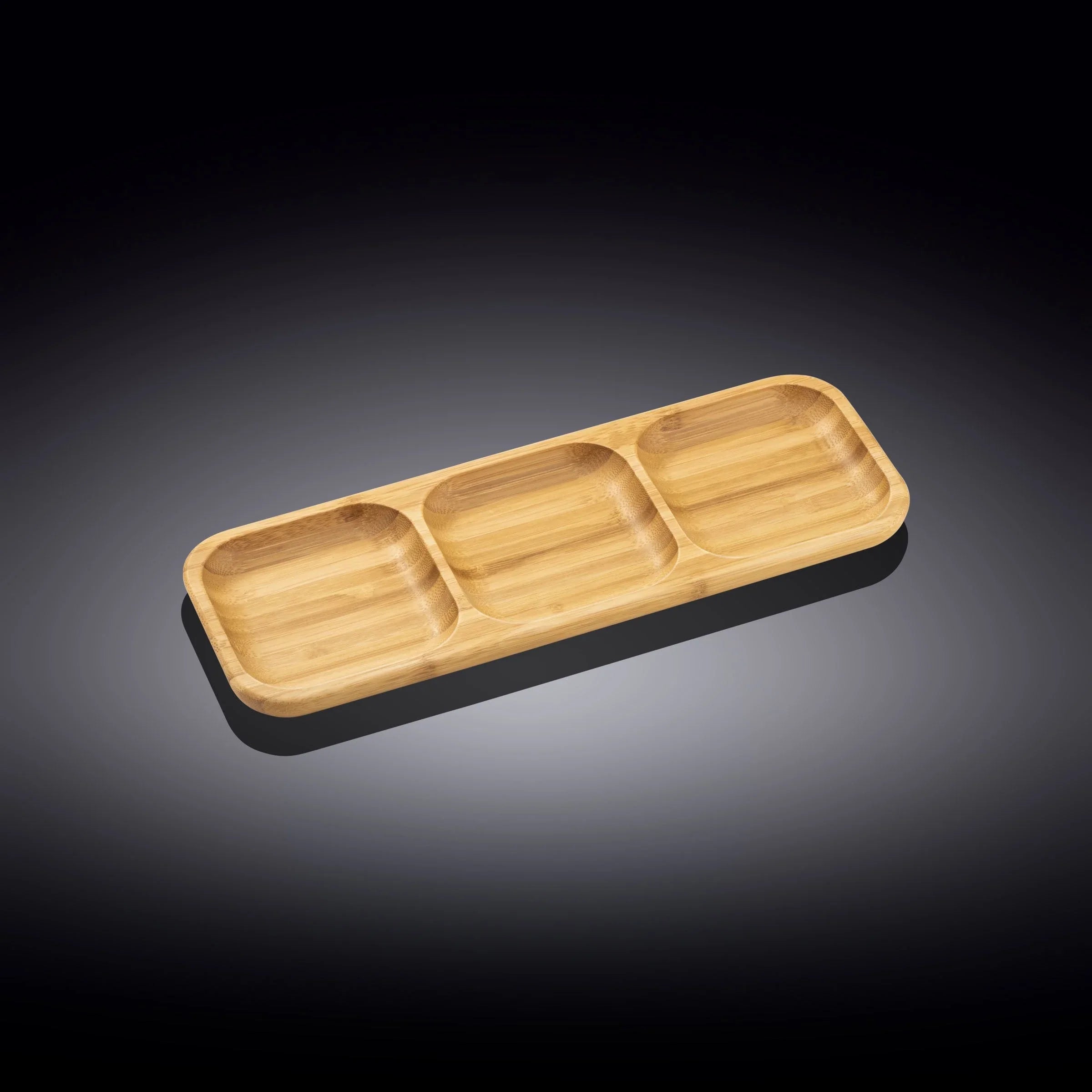 Sustainable bamboo triple-section serving tray on a dark background at Qu!rk Boutique.