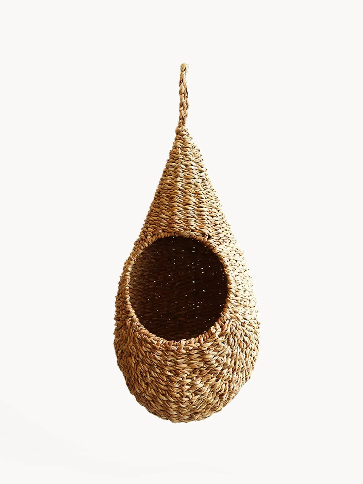 Handwoven hanging bird nest basket made of natural seagrass fibers