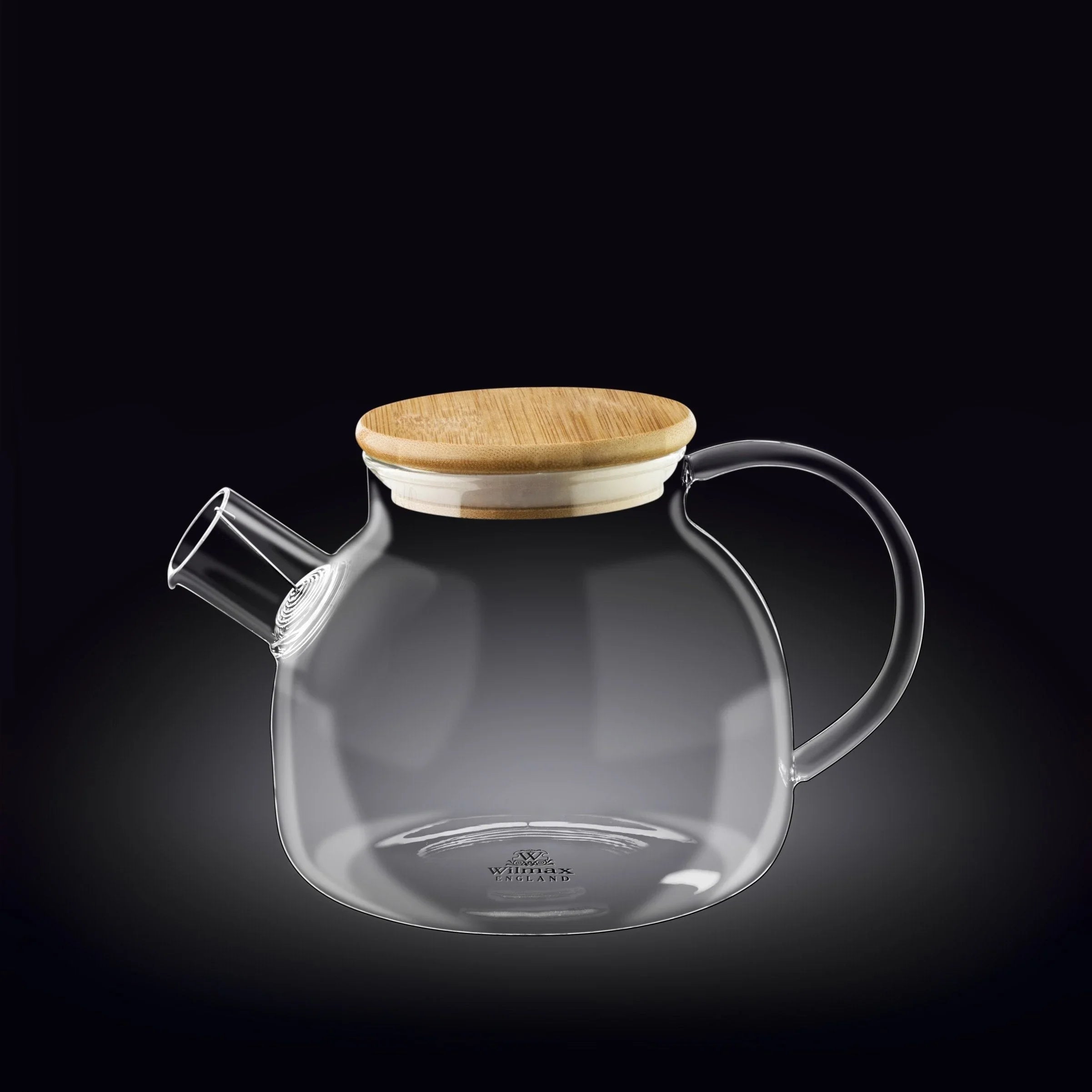 Clear glass teapot with a wooden lid, modern design, on black background at Qu!rk Boutique