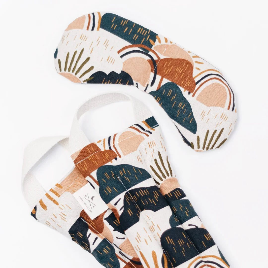 Colorful abstract print eye mask and wrap set from Qu!rk Boutique on white background