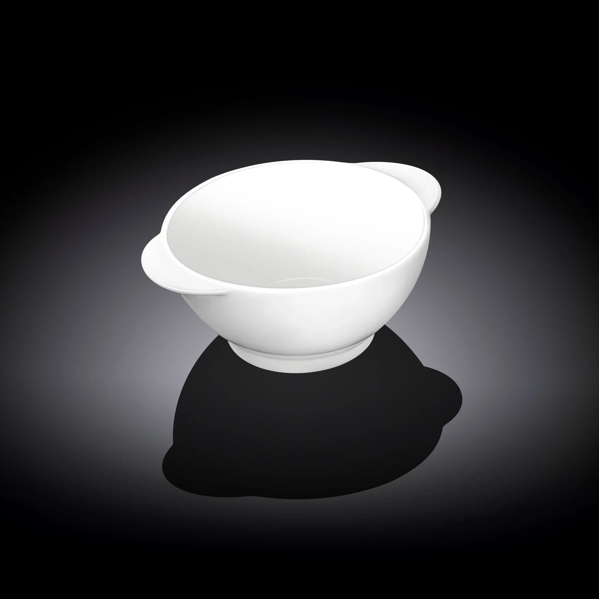 White ceramic mixing bowl with handles on black gradient background
