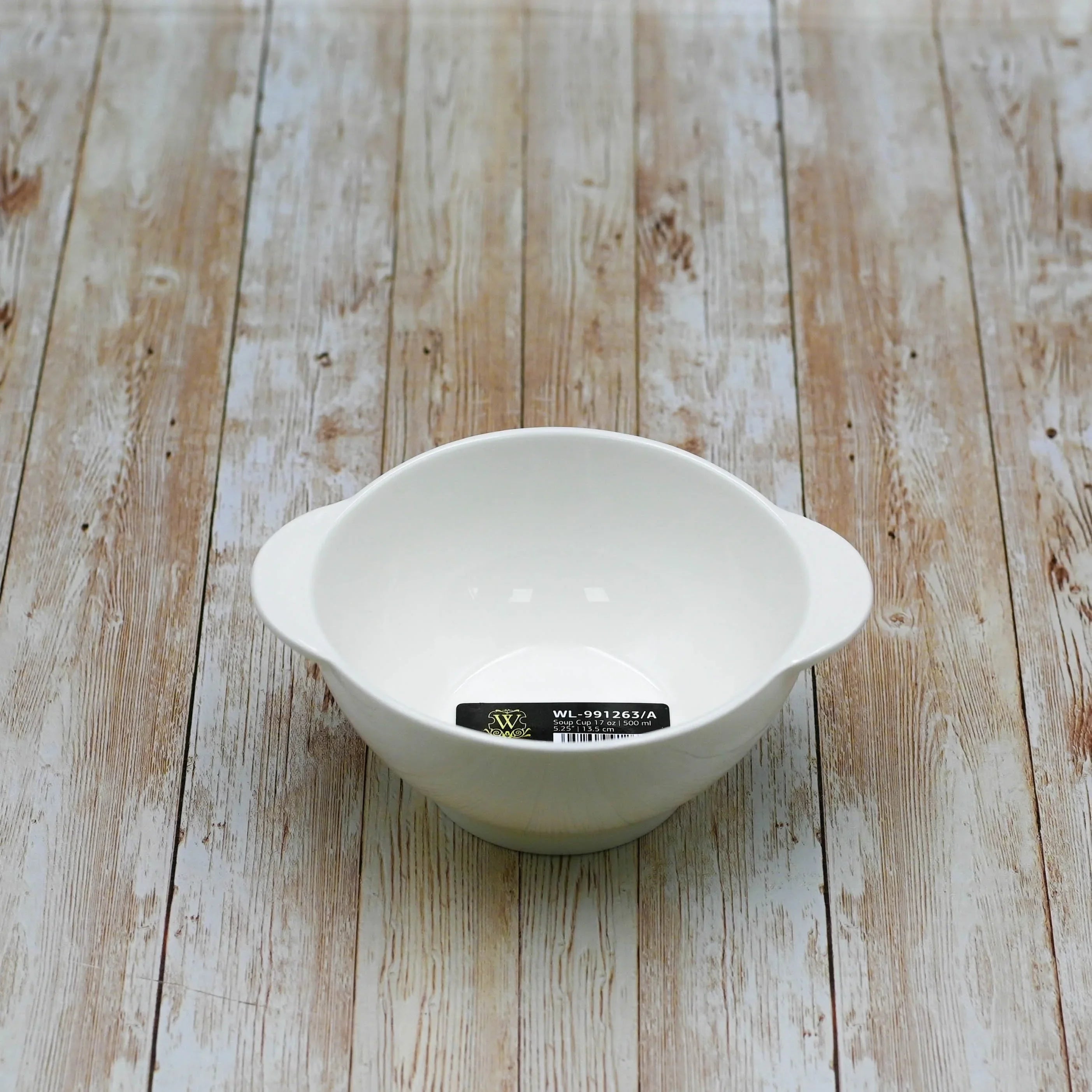 White ceramic soup cup with handles on rustic wooden surface, labeled WL-991263/A