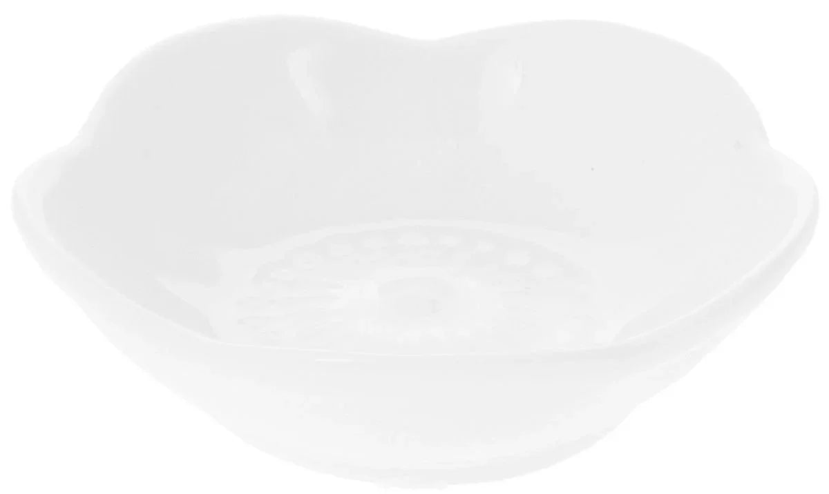 White ceramic scalloped bowl with embossed design, artist-designed home decor from Qu!rk Boutique